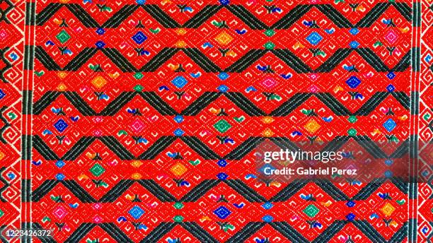 a mayan textile from chiapas, mexico - mexican embroidered fabric stock pictures, royalty-free photos & images