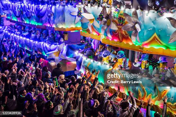 Crowds screaming for beads thrown from floats on the Endymion parade during Mardi Gras on 22nd February 2020 in New Orleans, Louisiana, United...