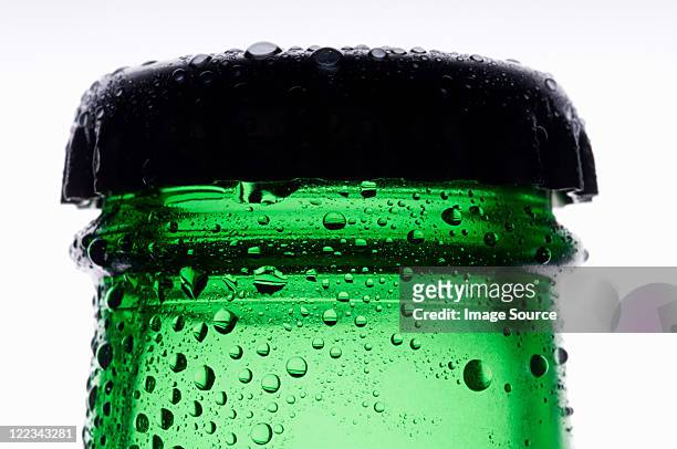 bottle of lager, close up - bottle condensation stock pictures, royalty-free photos & images