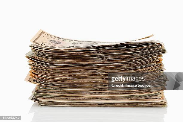 stack of dollar banknotes - piles of money foto e immagini stock