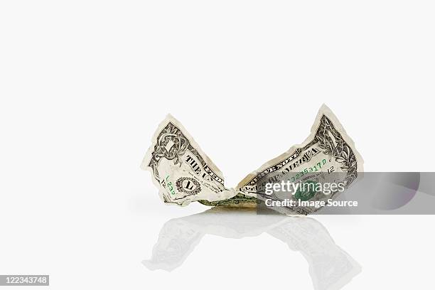 crumpled dollar bill - prop stockfoto's en -beelden