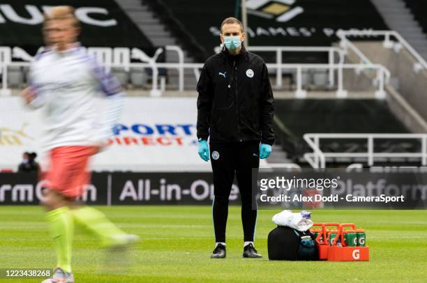 Member of the Manchester City team watches on during the warm up before the the FA Cup Quarter Final match between Newcastle United and Manchester...