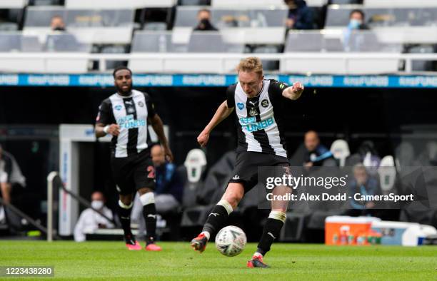 Newcastle United's Sean Longstaff shoots at goal during the FA Cup Quarter Final match between Newcastle United and Manchester City at St. James Park...