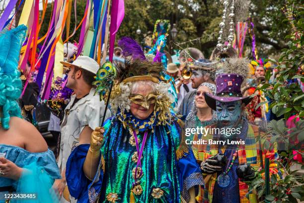 The Society of Saint Anne parade during Mardi Gras on 25th February 2020 in Bywater district of New Orleans, Louisiana, United States. Mardi Gras is...