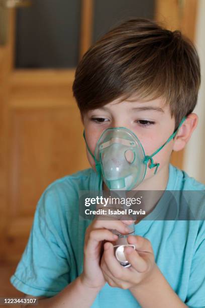 Child Using An Inhaler 28 Child Using Inhaler With Spacer Stock Photos, High-Res Pictures, and ...