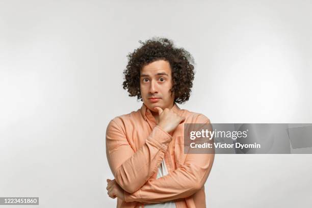 emotional portrait of a curly guy with brown hair - israeli ethnicity bildbanksfoton och bilder