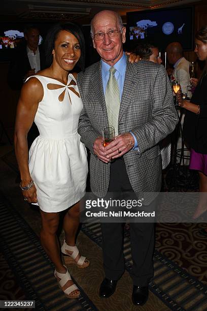 Dame Kelly Holmes and Sir Bobby Charlton attends party hosted by Martina Navratilova at Westbury Hotel on June 26, 2010 in London, England.