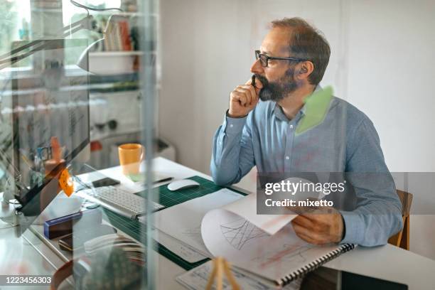 businessman working at office - screen partition stock pictures, royalty-free photos & images