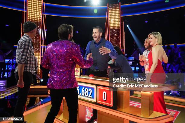 The Legend" - Host Elizabeth Banks can't stop the WHAMMY as contestants try to win those BIG BUCKS on "Press Your Luck," airing SUNDAY, JULY 12 , on...