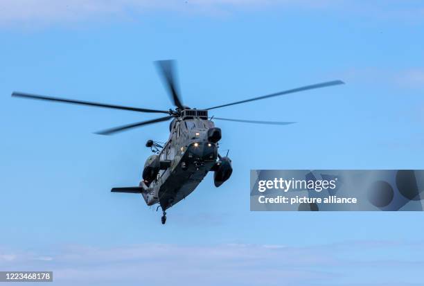 June 2020, Mecklenburg-Western Pomerania, Warnemünde: The rescue helicopter Sikorsky S-61 Sea King of the German Navy. Photo: Jens...