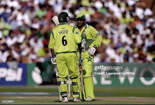 Saeed Anwar and Wajahatullah Wasti of Pakistan share in a record World Cup opening partnership in the semi-final against New Zealand at Old Trafford...