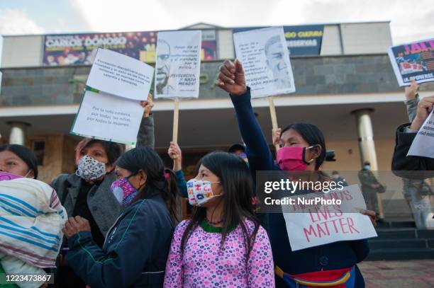 Indigenous women from the Embera communities in Colombia along with feminists gather in front of the military compound 'Canton Norte' to protest...