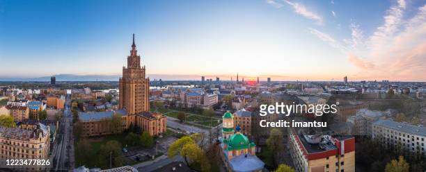 sunset above latgales suburb in riga, latvia - riga stock pictures, royalty-free photos & images