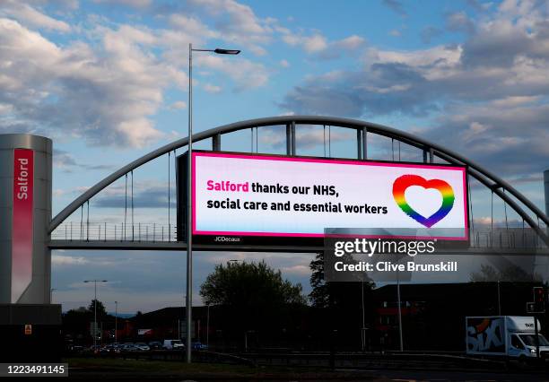 Sign over a busy road in Salford thanking the NHS, social care and essential workers prior to the NHS Applause for key workers on May 07, 2020 in...