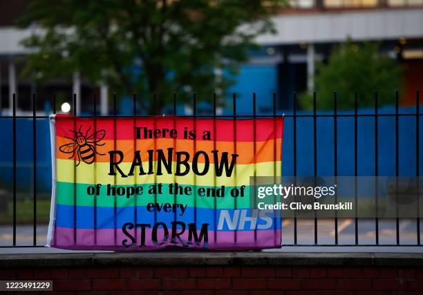 Rainbow sign on the railings prior to the applause for key workers at Salford Royal Hospital on May 07, 2020 in Salford, United Kingdom. Following...