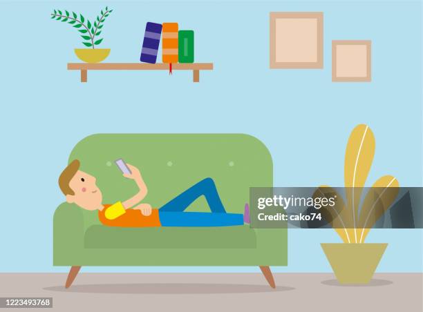man lying on sofa - phone couch stock illustrations
