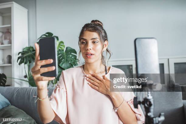 teenage girl at home vlogging - very young webcam girls stock pictures, royalty-free photos & images