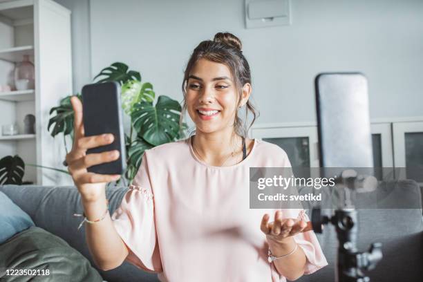 teenage girl at home vlogging - very young webcam girls stock pictures, royalty-free photos & images
