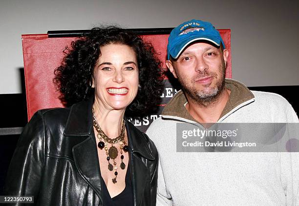 Programmer Hebe Tabachnik and director Jose Padilha speaks onstage during the "Secrets Of The Tribe" Q&A during the 2010 Los Angeles Film Festival at...