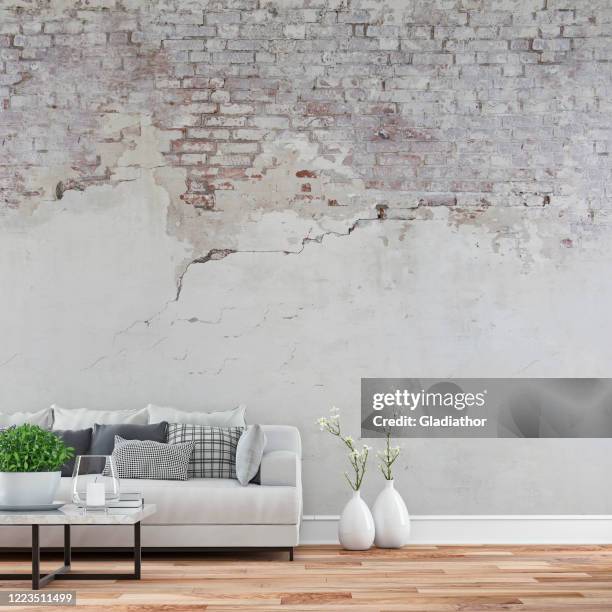 lege woonkamer met witte bank, lijst en decoratie - table brick wall wood stockfoto's en -beelden