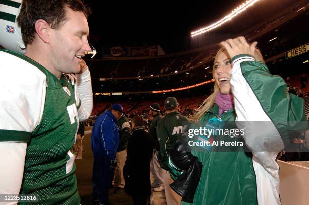 Stacy Keibler meets with New York Jets punter Ben Graham at the New York Jets vs New England Patriots game at The Meadowlands on December 26, 2005 in...