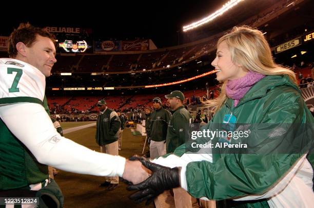 Stacy Keibler meets with New York Jets punter Ben Graham at the New York Jets vs New England Patriots game at The Meadowlands on December 26, 2005 in...
