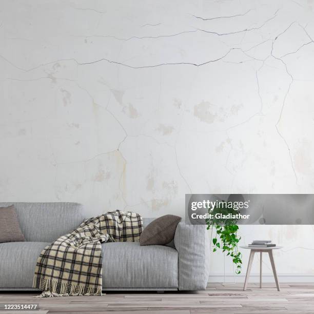 elegant living room with sofa front view left - cracked plaster stock pictures, royalty-free photos & images