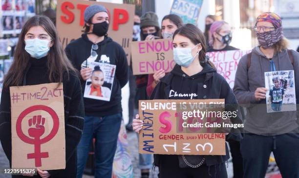 Protesters march against Gender Based Violence outside Parliament on June 30, 2020 in Cape Town, South Africa. The group condemned violence against...