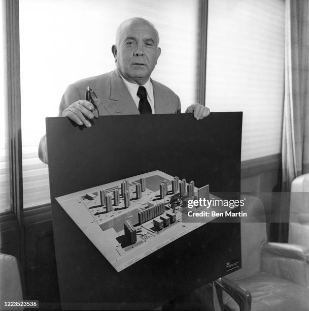 Spyros Skouras President of 20th Century Fox film studios, with model of the studio lot, 1957.