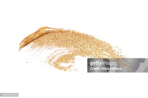 golden brushstroke of cosmetics - ceremonial make up stock pictures, royalty-free photos & images