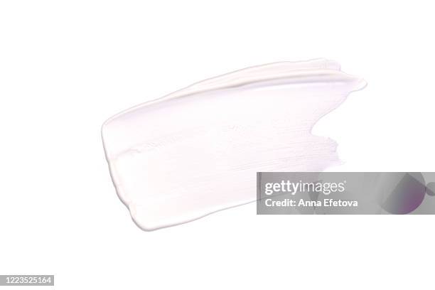 white smear of cream - white colour swatches stock pictures, royalty-free photos & images