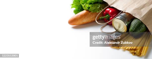 paper bag with food. donation and home delivery. banner. - bread charity stock pictures, royalty-free photos & images