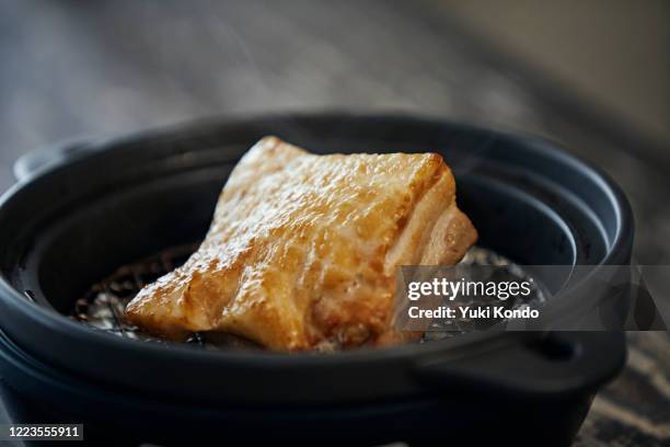 smoked pork in a pan. - smoked stock pictures, royalty-free photos & images