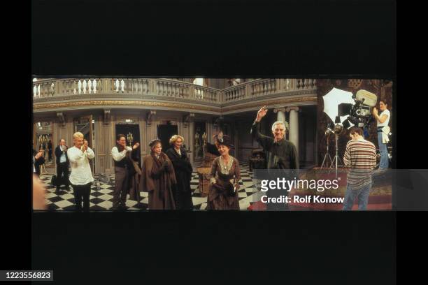 Charlton Heston is applauded by Kenneth Branagh and cast and filmcrew after his last day on the film "Hamlet", directed by Kenneth Branagh