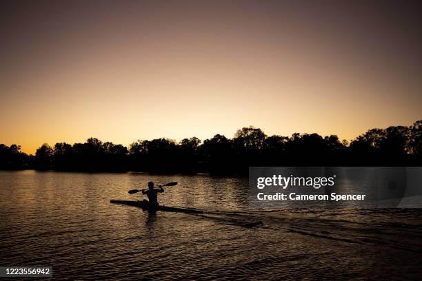 Australian Kayaker Murray Stewart trains in isolation at Narrabeen lake on May 08, 2020 in Sydney, Australia. Athletes across the country are now...