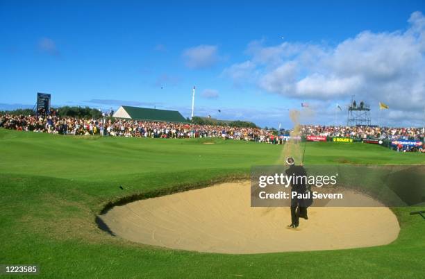 Bob Charles of New Zealand plays out of a bunker at the British Senior Open at Royal Portrush Golf Club in Northern Ireland. \ Mandatory Credit: Paul...