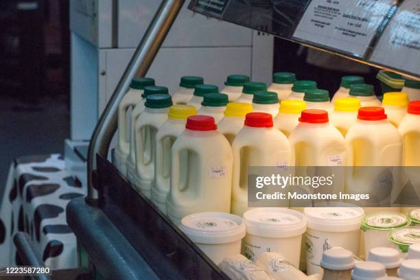 milk bottles in borough market, london - lid stock pictures, royalty-free photos & images