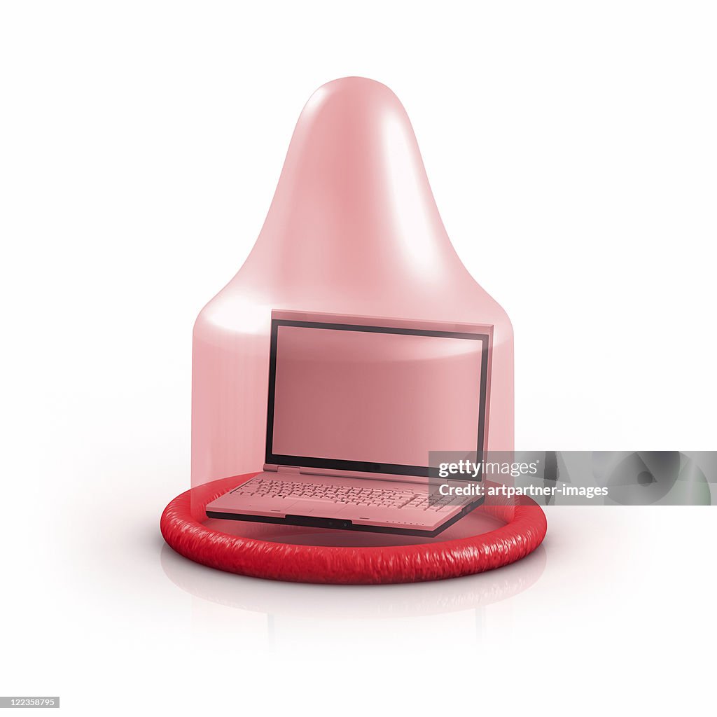 Condom covering a laptop on white