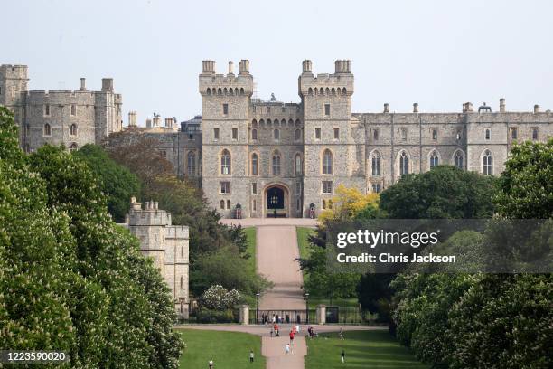 General view of people on The Long Walk and Windsor Castle, with Queen Elizabeth II in residence, on May 08, 2020 in Windsor, United Kingdom.The UK...