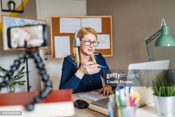 professor working from home and using internet for online class with students - lecturer online stock pictures, royalty-free photos & images