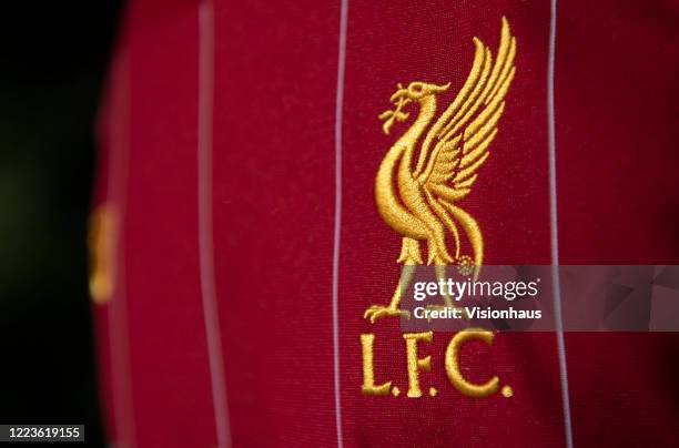 The Liverpool club crest on the first team home shirt displayed on May 5, 2020 in Manchester, England
