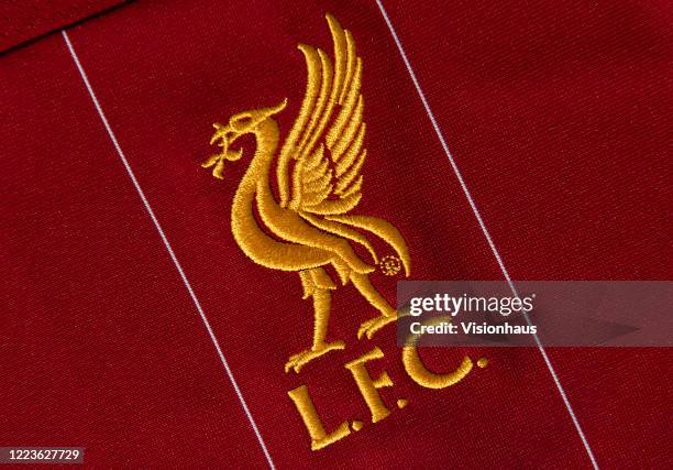 The Liverpool club crest on the first team home shirt on May 4, 2020 in Manchester, England
