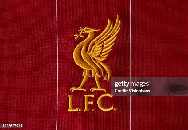 The Liverpool club crest on the first team home shirt on May 4, 2020 in Manchester, England