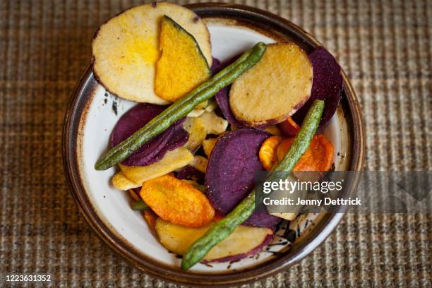 vegetable chips - pumpkin oil stock pictures, royalty-free photos & images