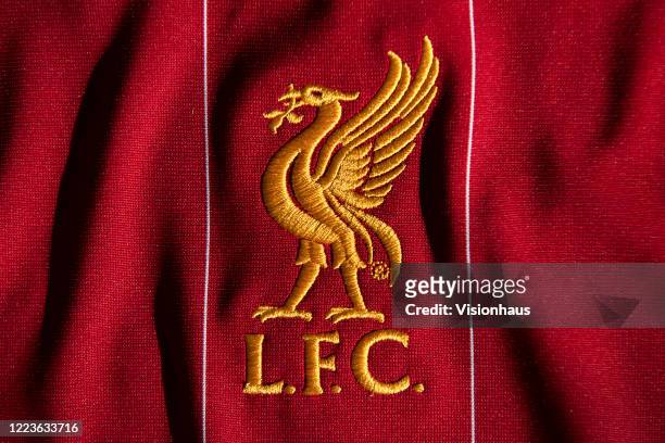 The Liverpool club crest on the first team home shirt displayed on May 6, 2020 in Manchester, England