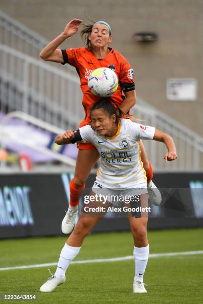 Erin Simon of Houston Dash jumps over Arielle Ship of the Utah Royals FC in the first round of the NWSL Challenge Cup at Zions Bank Stadium on June...