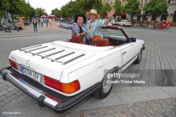 Maximilian Seitz and Barbara Engel attend the Anja Gockel Fashion Show Sommer 2021 "ASUKA - Der Duft von morgen" at Hotel Adlon Kempinski on June 30,...