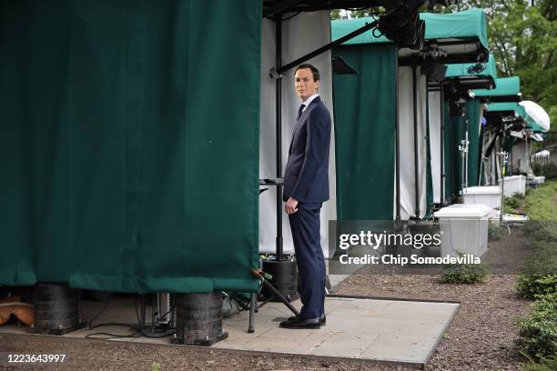 Senior Advisor to President Donald Trump and son-in-law Jared Kushner prepares to talk to FOX News outside the White House on the morning that the...