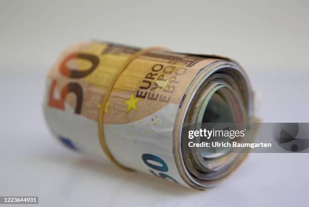 The money and always problems. Symbol photo on the subjects euro, Monery laundering, economy, white-collar crime, justice, courts, trade, world...
