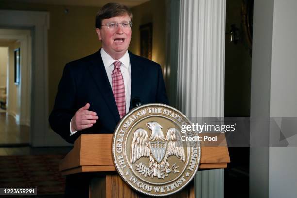 Mississippi Republican Gov. Tate Reeves delivers a televised address prior to signing a bill retiring the last state flag in the United States with...